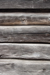 Country house wall from old wooden logs. Natural wooden backgrou