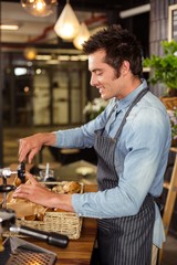 Waiter serving viennese pastries to a customer