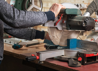 Carpenter cutting wood