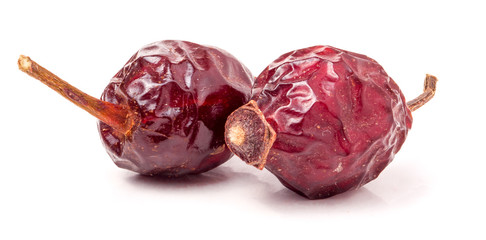 dry rosehip berries on the white background