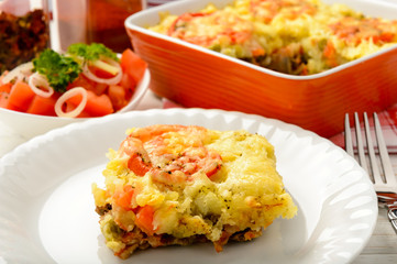 Casserole with minced meat, vegetables and cheese.