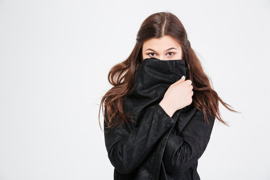 Pretty Young Woman Covered Her Face With Black Jacket