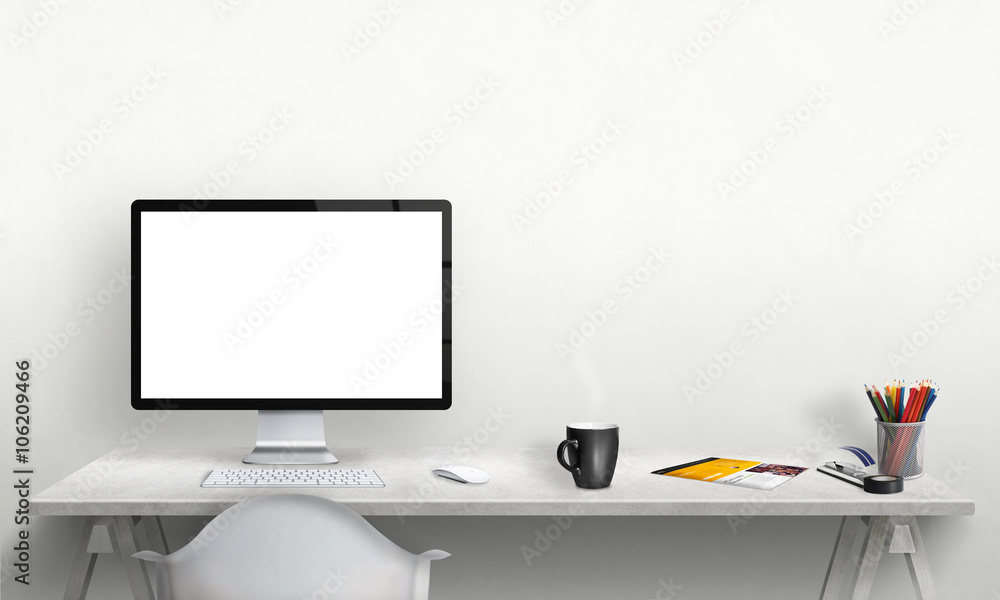 Aufkleber Isolated computer display for mockup in office interior. Work desk with keyboard, mouse, cup of coffee, paper, pencils. Free space on wall for text.