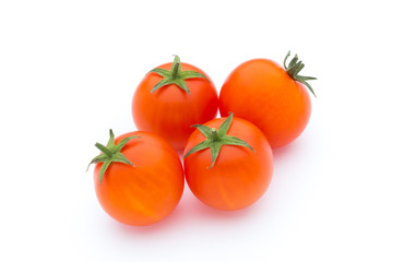 Tomato on the white isolatd background.