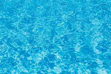 Ripples on the water in the swimming pool.