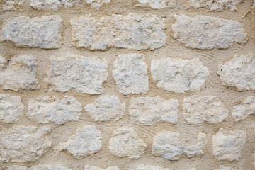 surface of vintage stone wall at old house