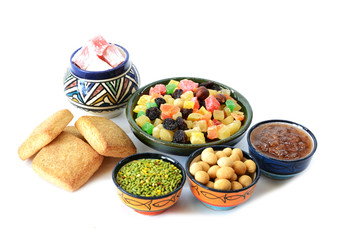 Various delicious ingredients for breakfast. Jam, lokum, nuts, dried fruits. Isolated on white background