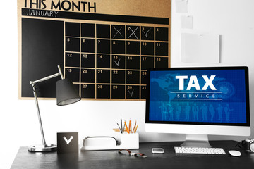 Online Tax payment concept. Comfortable workplace with modern computer