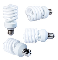 Energy-saving fluorescent lamp isolate on a white background, from different angles, closeup.