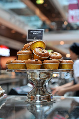 Tasty sugar muffins with almond and walnuts