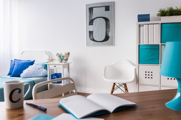 Homework waiting for boy in his room