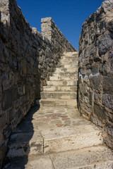 Fototapeta na wymiar Stone stairway in the old town Budva.