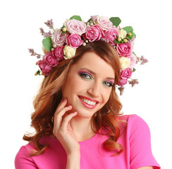 Fototapeta premium Beautiful young woman wearing floral headband isolated on white background