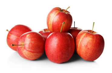 Pile of red juicy apples isolated on white background