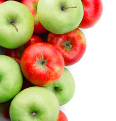 Pile of ripe juicy apples isolated on white background