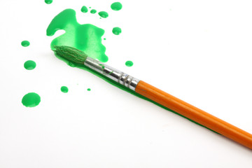  green paint and brush