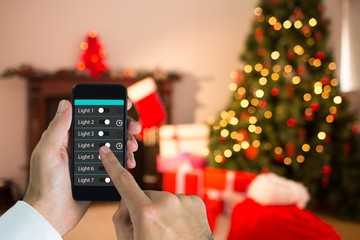 Man using home automation at christmas time
