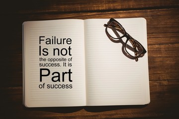 Composite image of success quote on book