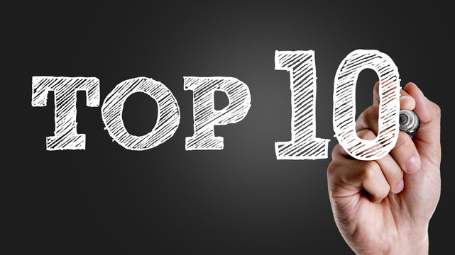 Hand writing the text: Top 10