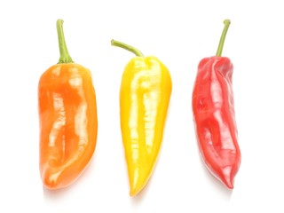 Three peppers on white background