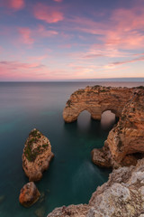 The magical landscape sunset beach Marinha.