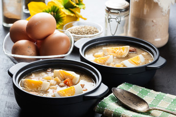 The sour soup made of rye flour with eggs