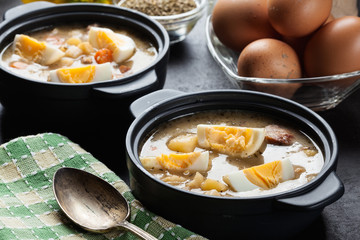 The sour soup made of rye flour with eggs
