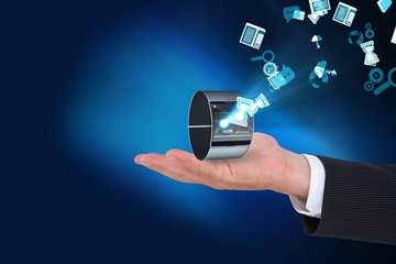Businessman holding smart watch with icons