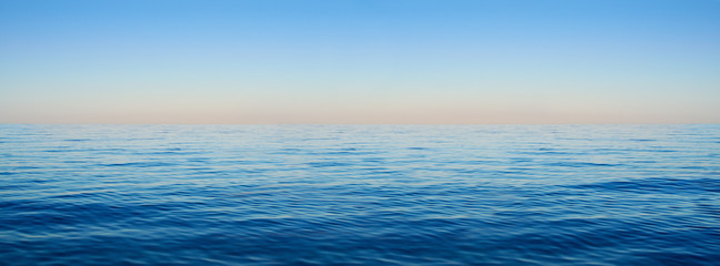 Panorama of sea waves on the background of dawn