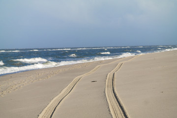 Tire tracks on the beach