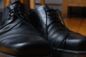 Black shoes lacing. Close-up.