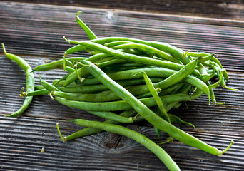 Green beans on wooden background - 106234887