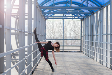 Fototapeta na wymiar sports woman doing stretching outdoors