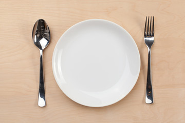 table setting. plate fork knife white empty