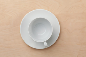 A circle plate and cup on the table
