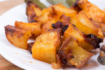 Roasted potatoes in the plate