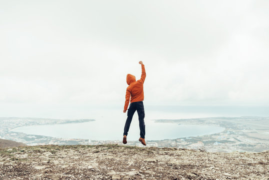 Happy Traveler Guy Jumping Outdoor