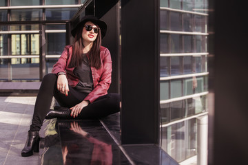 Young beautiful woman enjoying in the city