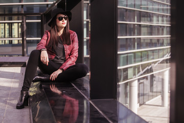 Young beautiful woman relaxing in the city