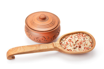 clay pots, wooden spoon and rice