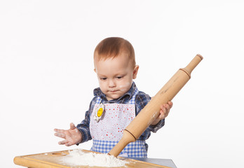 Little cook with flour