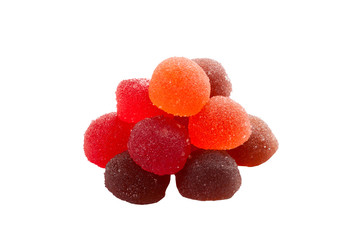 Fruit candy heap isolated on white background.