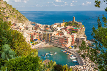 Scenic view of ocean and harbor in colorful village Vernazza, Ci