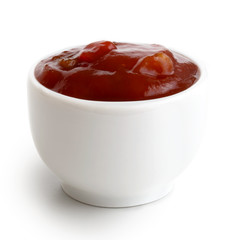 Small condiment bowl of  tomato and red chilli pepper salsa.