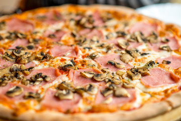 pizza on a wooden submitted