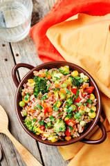 broccoli, corn, red pepper, green peas red and white rice