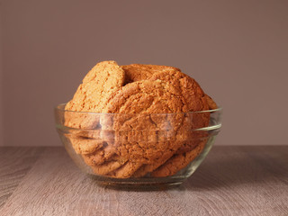 Sweet oatmeal cookies in glass plate