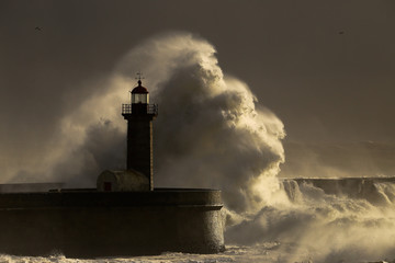 Storm with big waves near a lighthouse - 106244692