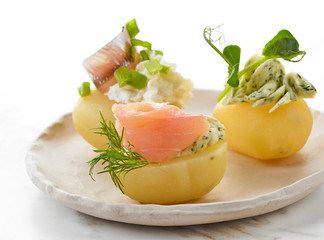 decorated boiled potatoes on plate