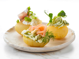 decorated boiled potatoes on plate